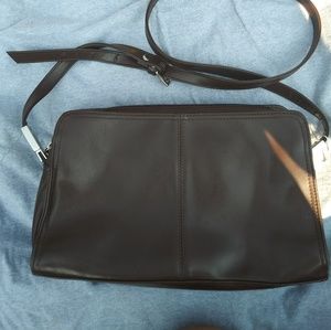 Three hand bags...